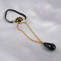 bh188-d-bijou-penis-felin-noir-et-or